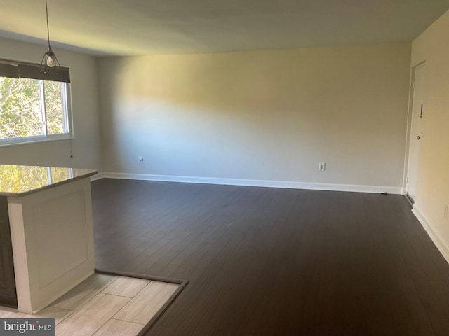 unfurnished dining area with hardwood / wood-style floors