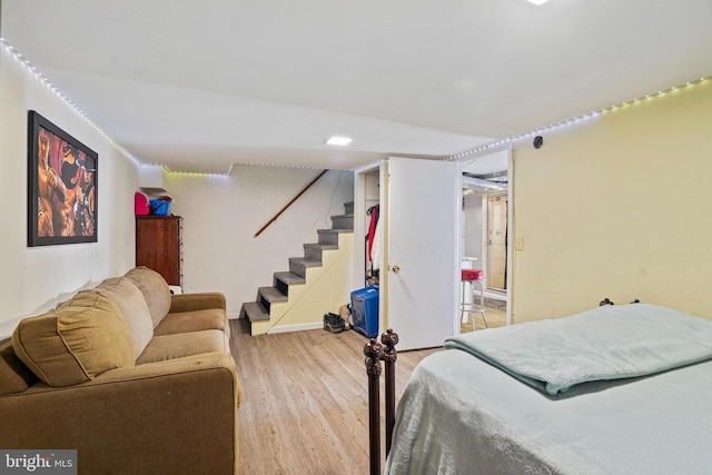 bedroom with hardwood / wood-style floors