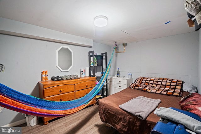 bedroom featuring hardwood / wood-style flooring