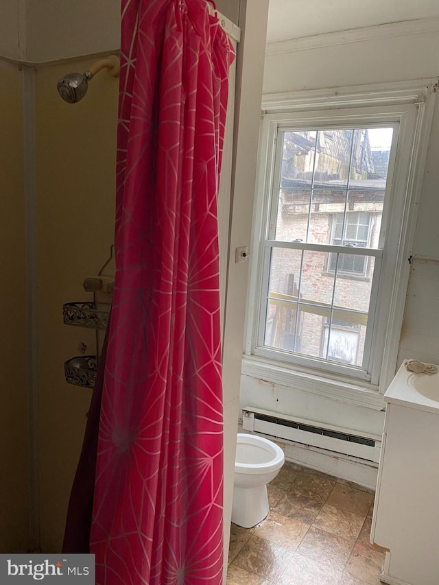 bathroom with a shower with curtain, toilet, ornamental molding, and a baseboard radiator