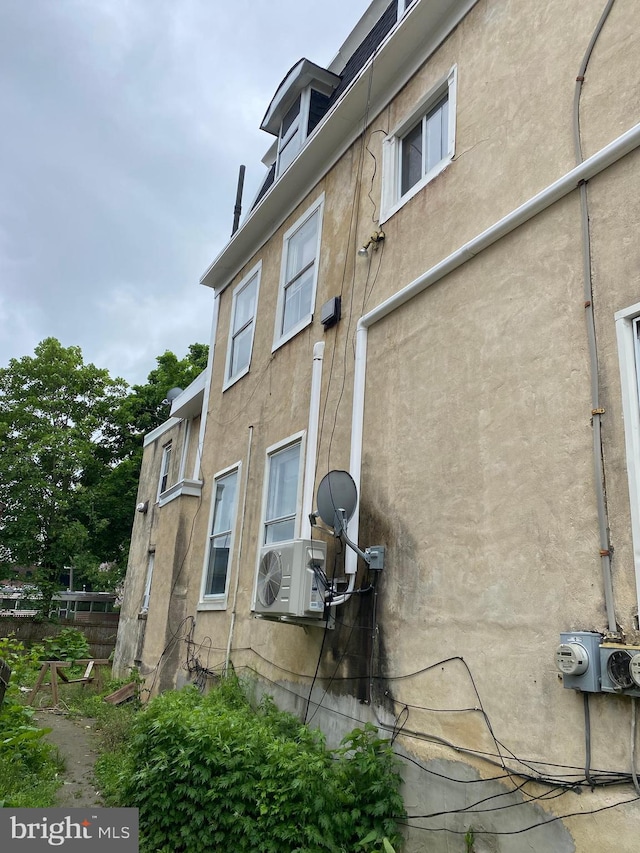 view of home's exterior featuring ac unit