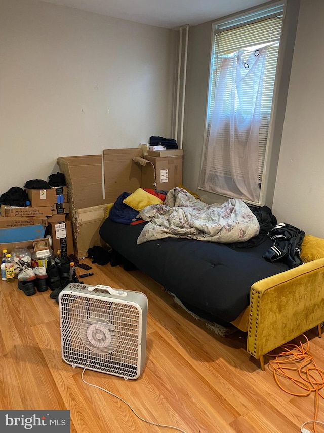 bedroom with hardwood / wood-style floors