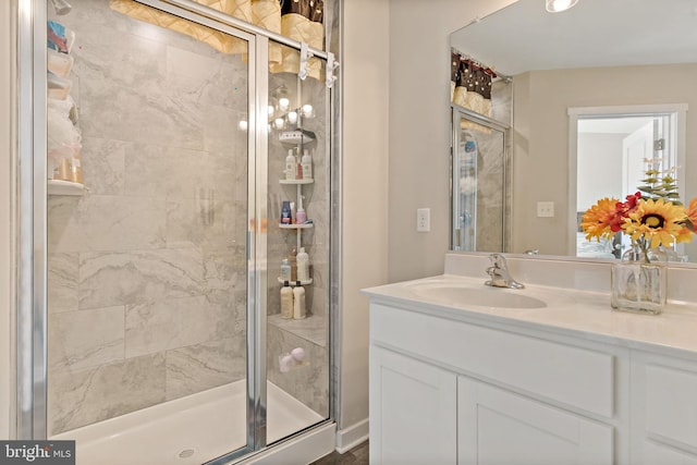 bathroom featuring vanity and walk in shower