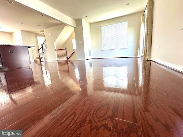 unfurnished room featuring wood-type flooring