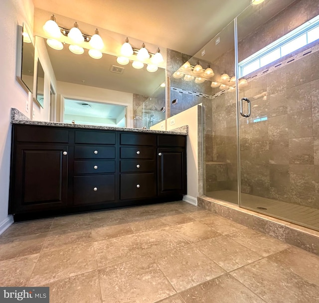 bathroom featuring vanity and walk in shower