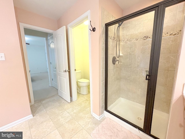 373 Northhampton Way, Middletown, DE 19709 - bathroom featuring a shower stall, tile patterned flooring, baseboards, and toilet