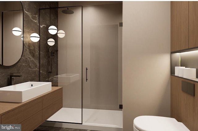 bathroom featuring vanity, an enclosed shower, decorative backsplash, and toilet