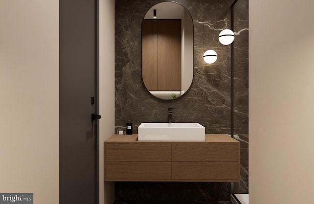 bathroom with vanity and backsplash