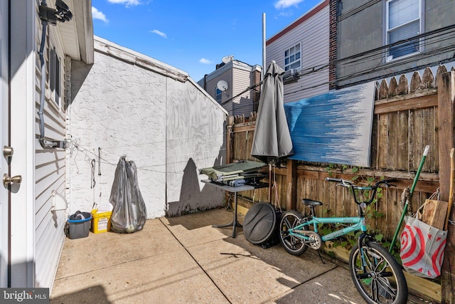 view of patio with a shed