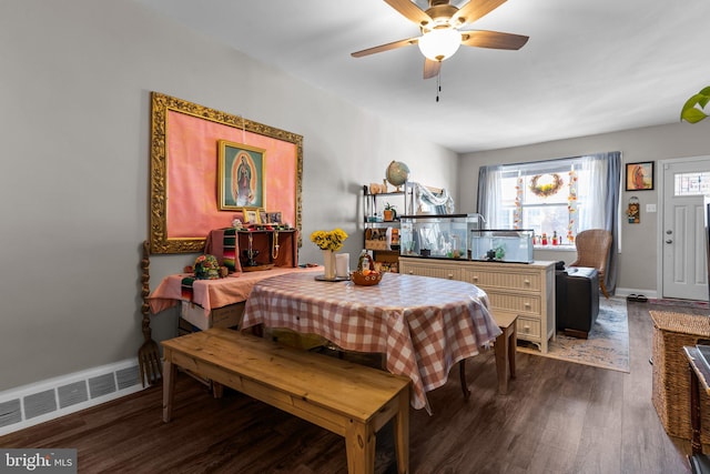 dining space featuring dark hardwood / wood-style floors and ceiling fan