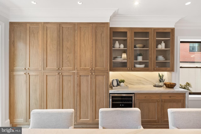 bar with decorative backsplash, wine cooler, and ornamental molding