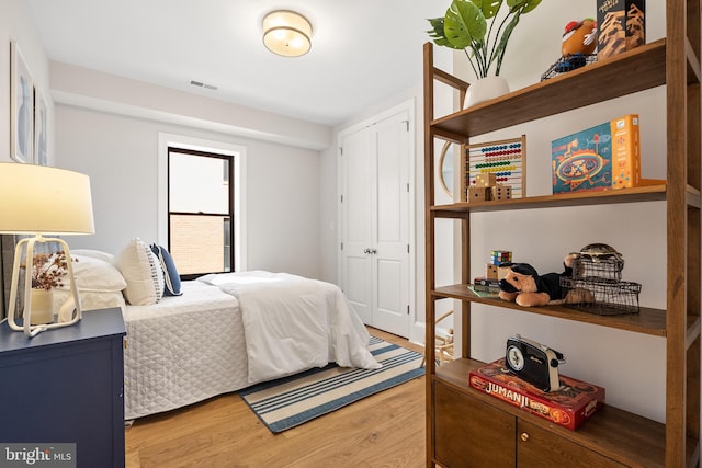 bedroom featuring wood-type flooring