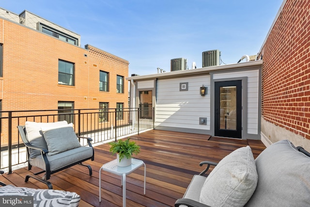 wooden deck featuring central AC