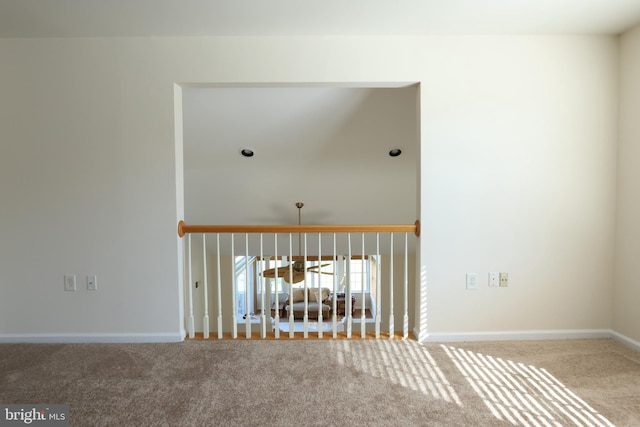 unfurnished room with carpet floors