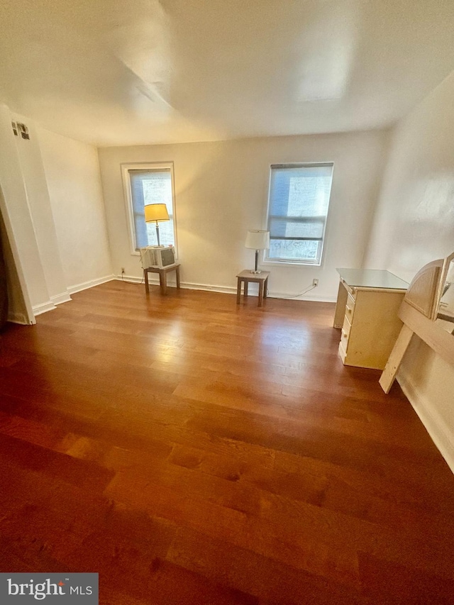 interior space featuring hardwood / wood-style flooring and a wealth of natural light