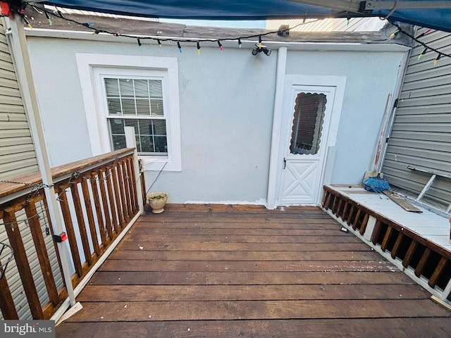 doorway to property featuring a deck