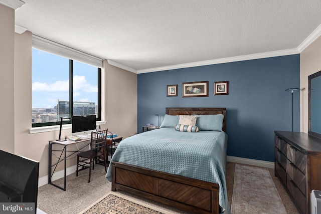 bedroom with a textured ceiling, baseboards, carpet floors, and ornamental molding