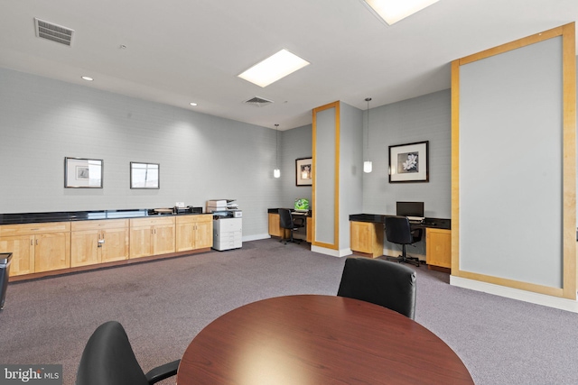 office with dark colored carpet, baseboards, and recessed lighting