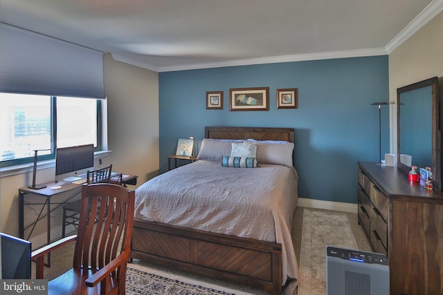 bedroom featuring light carpet and crown molding