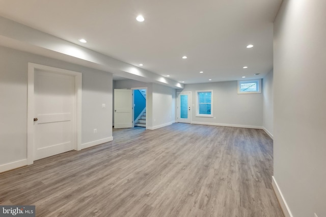 basement with light wood-type flooring