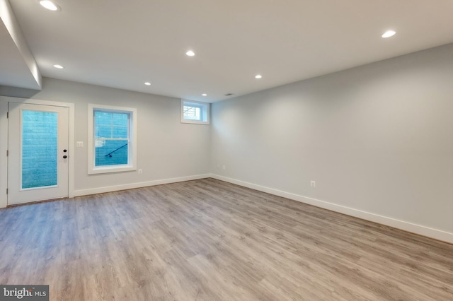 basement with light wood-type flooring