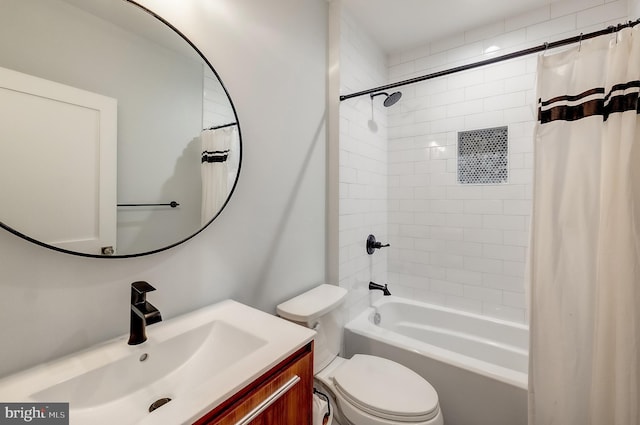 full bathroom with vanity, toilet, and shower / bath combo with shower curtain