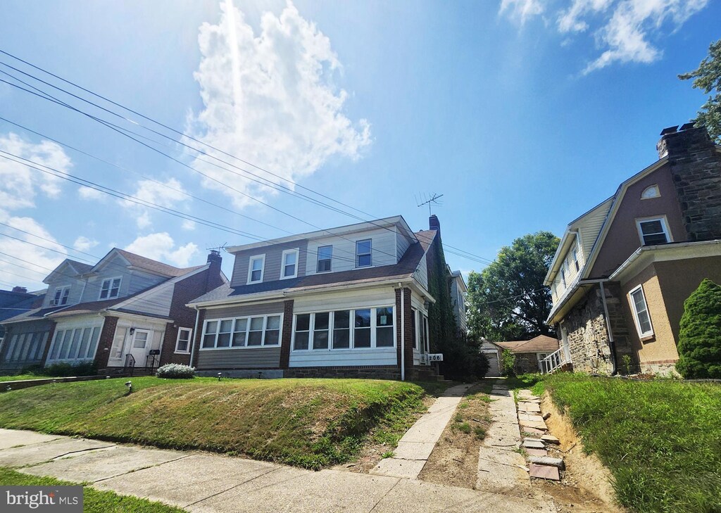 206 W Mowry St, Chester, PA 19013 - bungalow-style house featuring a chimney