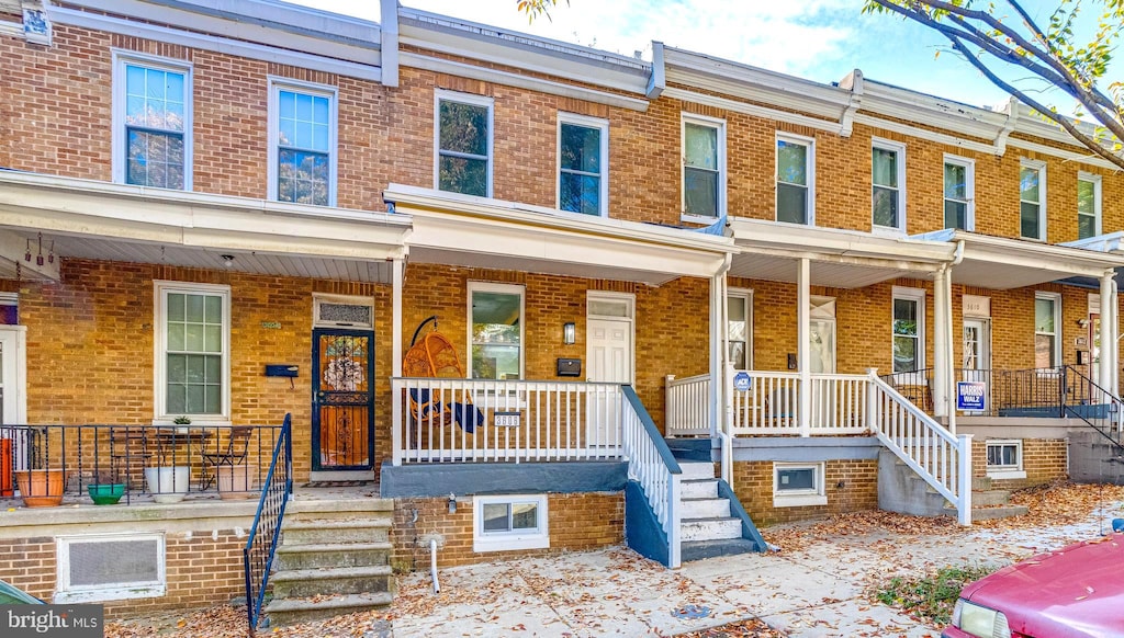 multi unit property featuring covered porch