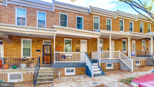 multi unit property featuring covered porch