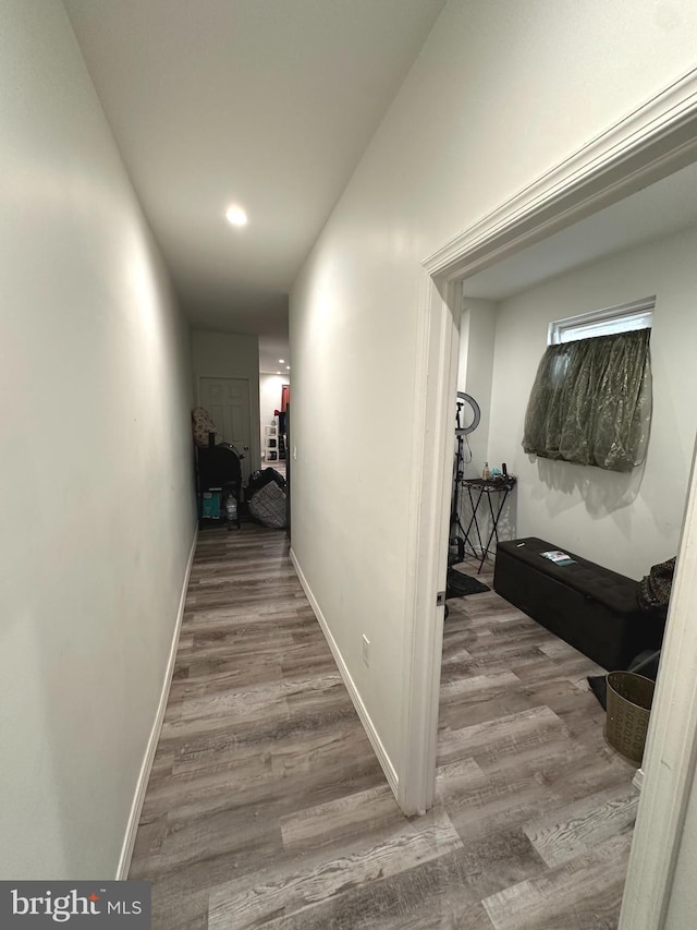 hallway featuring hardwood / wood-style floors