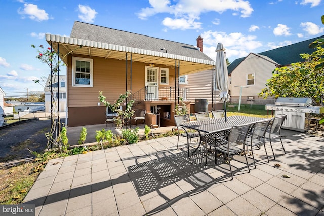 back of house featuring a patio