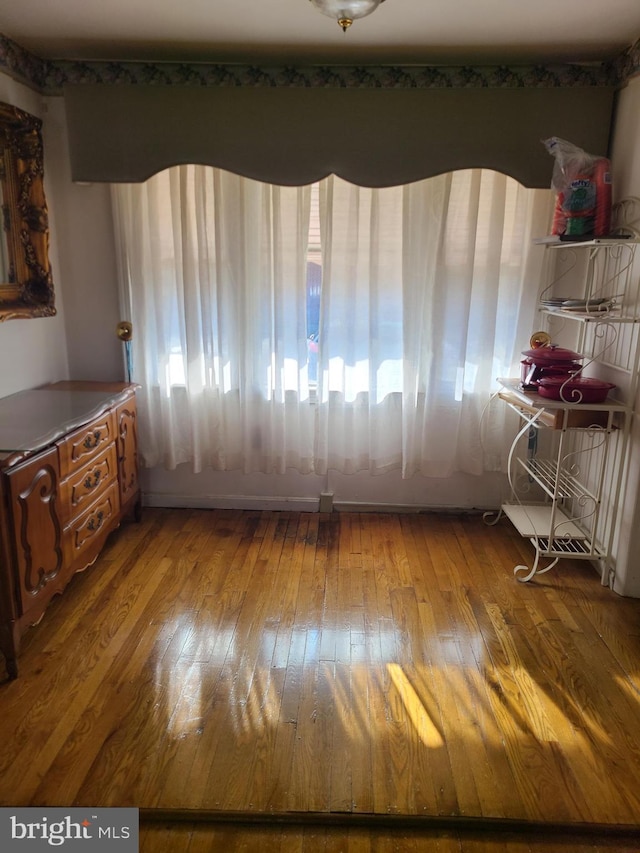 unfurnished dining area featuring light hardwood / wood-style flooring