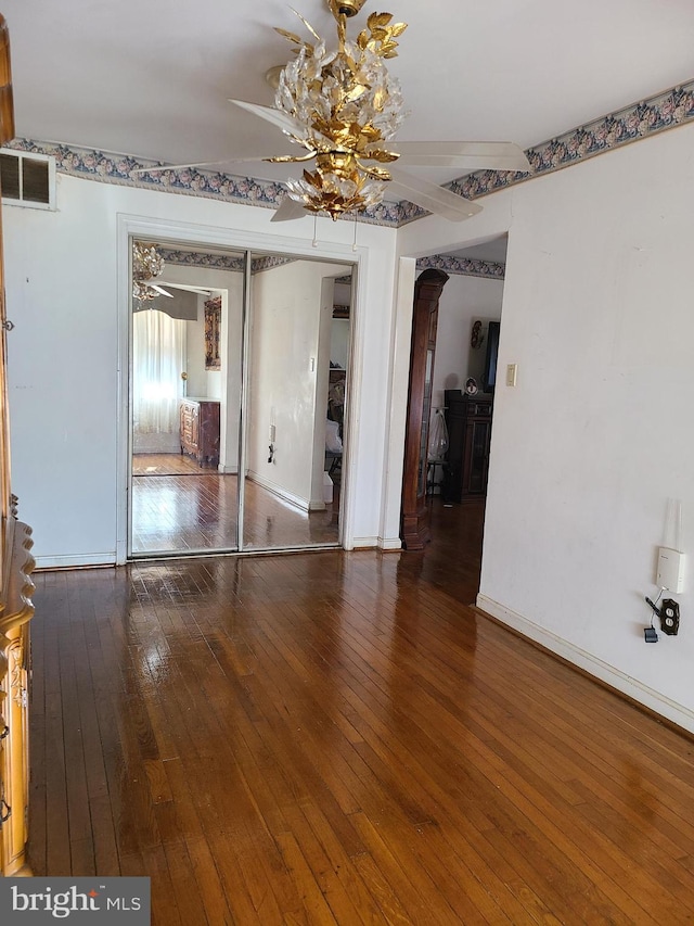 spare room featuring hardwood / wood-style floors