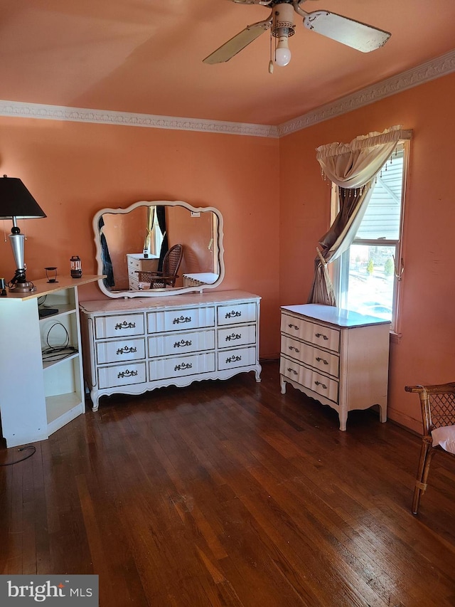 bedroom with dark wood-type flooring