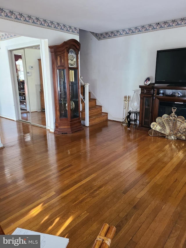 living room featuring dark hardwood / wood-style flooring