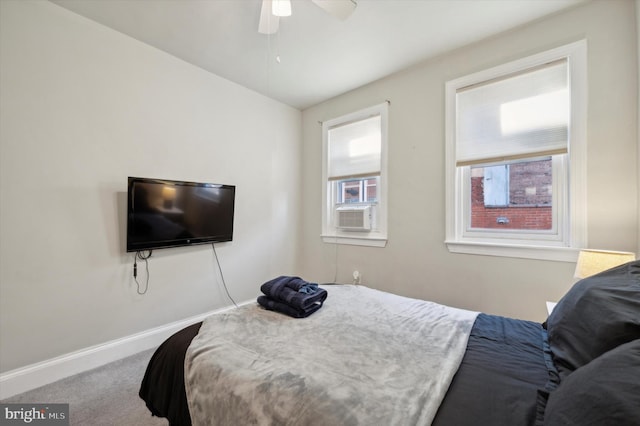 carpeted bedroom with ceiling fan, cooling unit, and lofted ceiling