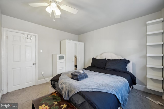 bedroom with carpet floors and ceiling fan