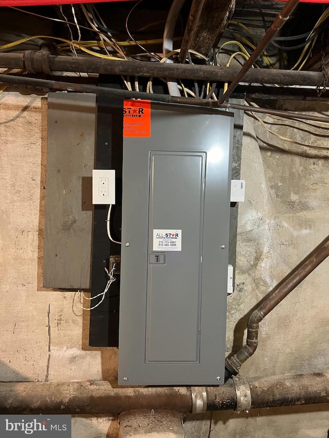 utility room featuring electric panel