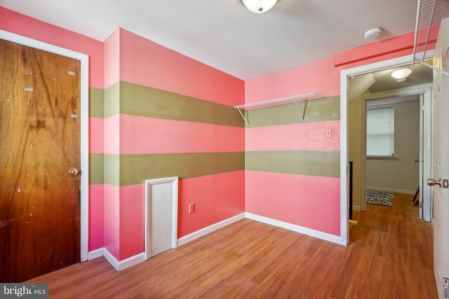 empty room featuring hardwood / wood-style floors