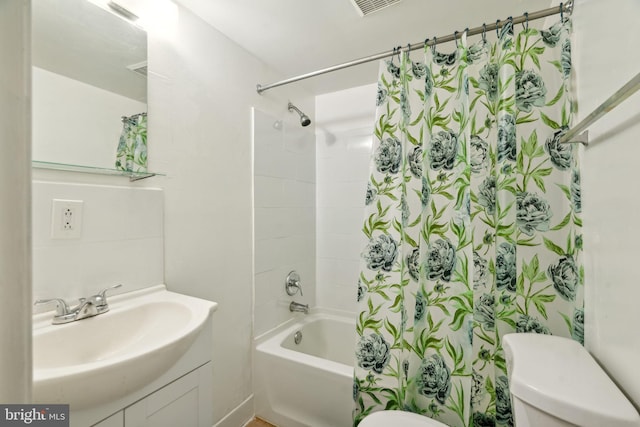 full bathroom featuring vanity, toilet, and shower / bath combo