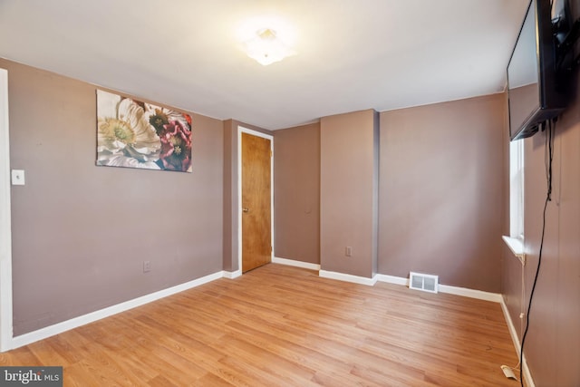 empty room featuring light wood-type flooring