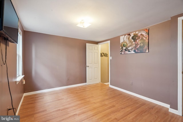 unfurnished bedroom featuring light hardwood / wood-style floors