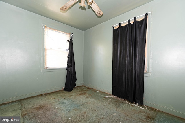 empty room featuring ceiling fan