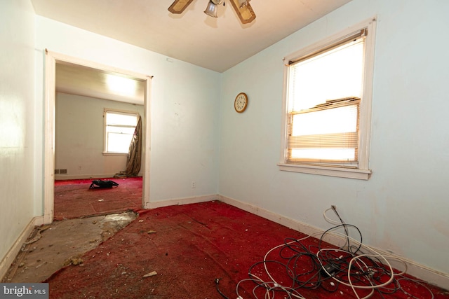 spare room with ceiling fan