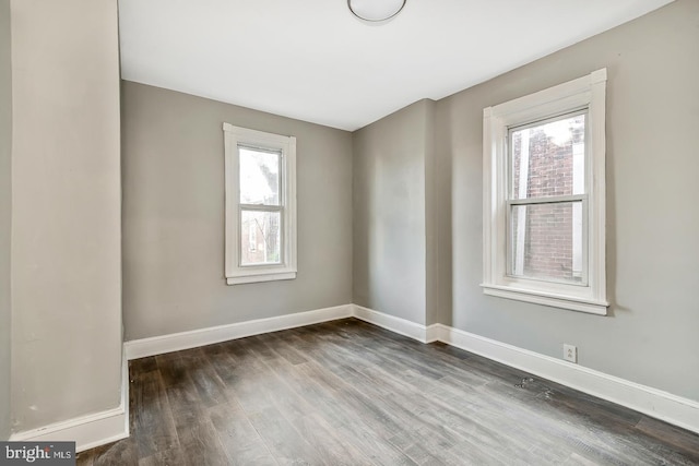 empty room featuring wood-type flooring