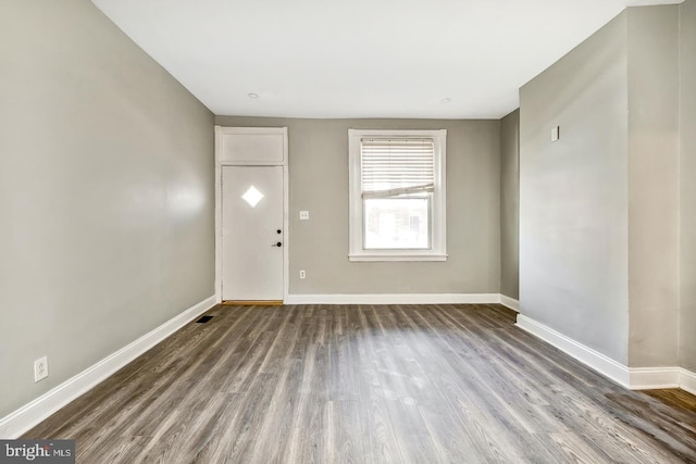 foyer entrance with hardwood / wood-style floors