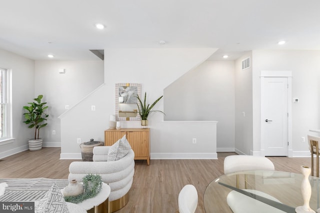 sitting room with light hardwood / wood-style floors