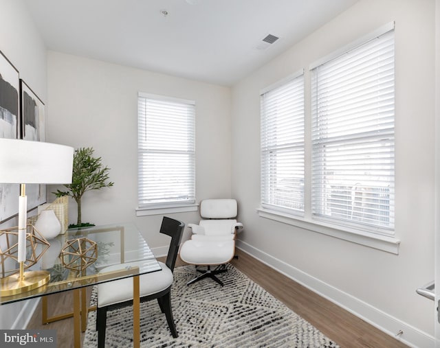 office area with hardwood / wood-style floors