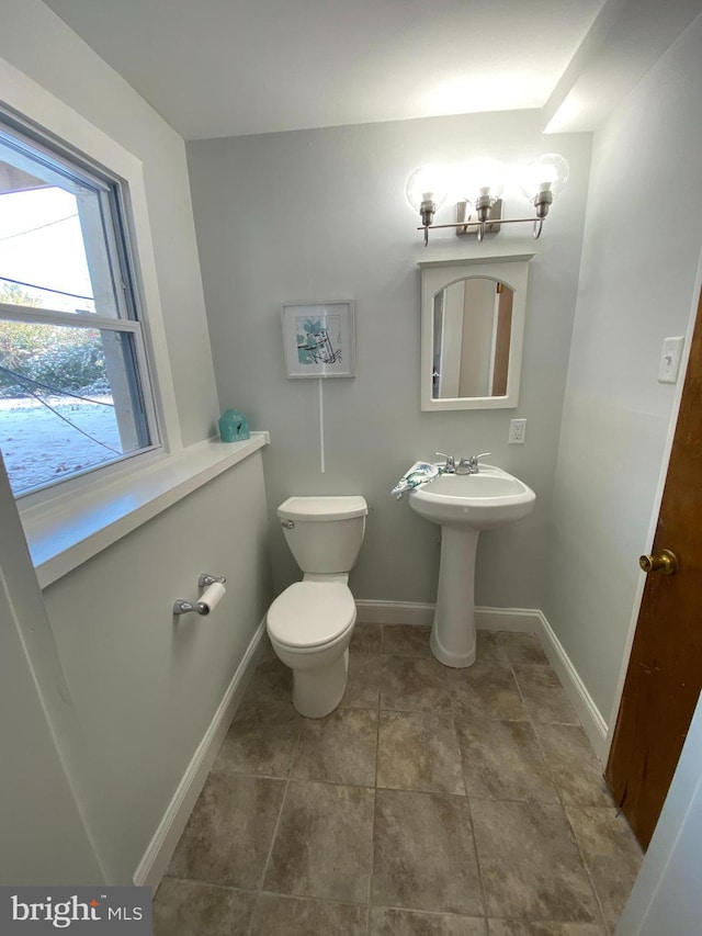 bathroom featuring toilet