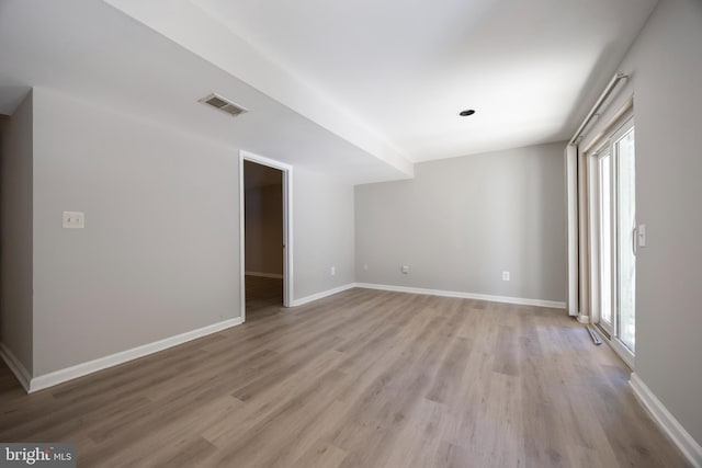 unfurnished room featuring light hardwood / wood-style flooring